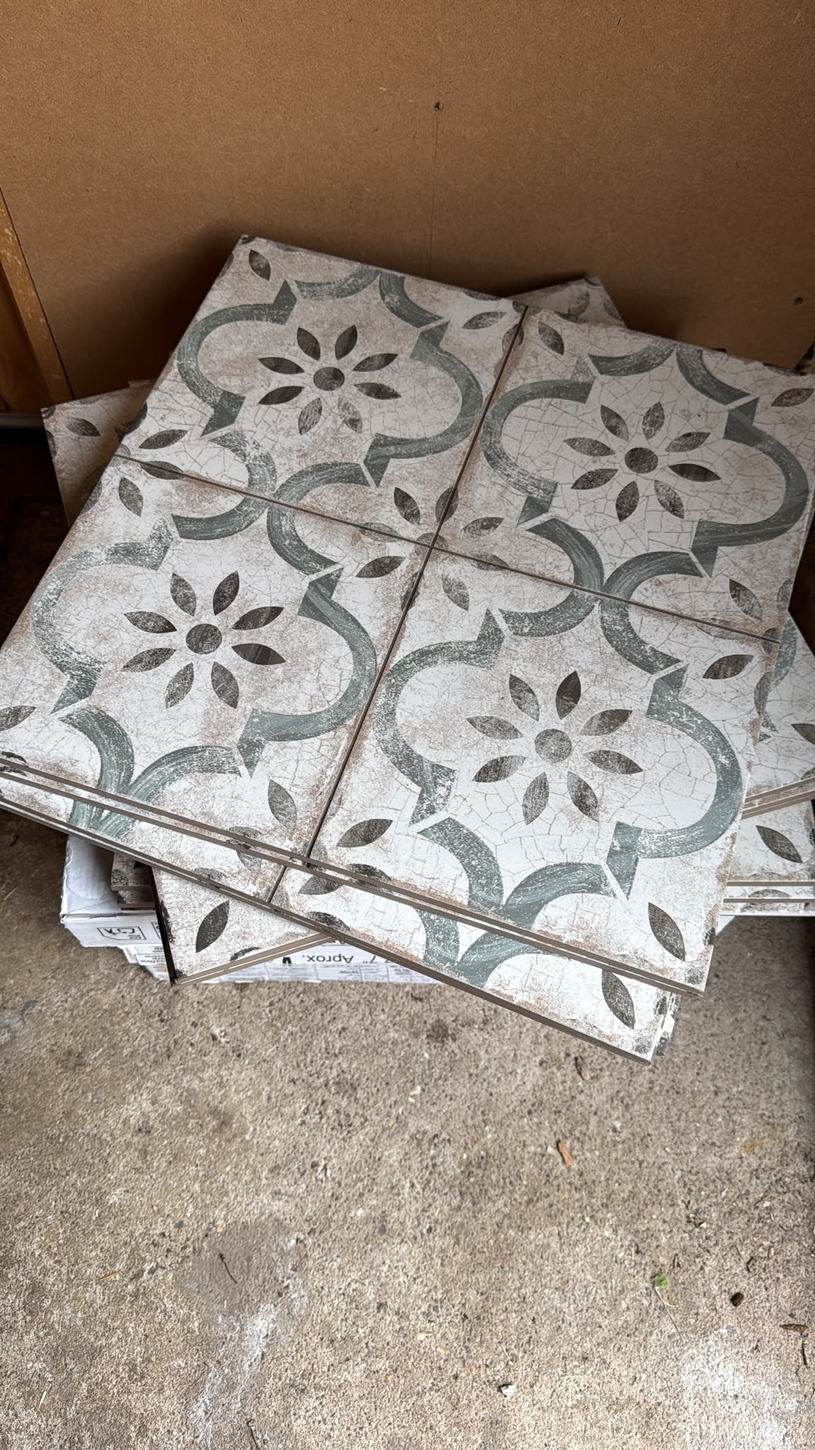Patterned encaustic floor tiles chosen for the writing room