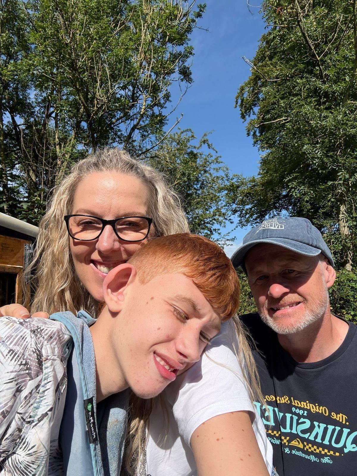 Claire, Carl and Finley outdoors